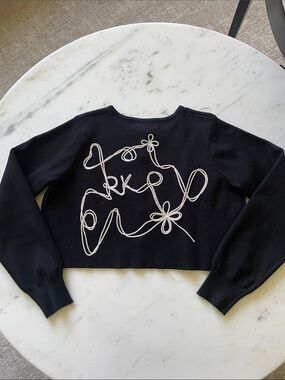 Retrokid Girl’s cropped cardigan, with back detail. Size 13-14. Fits like a 12